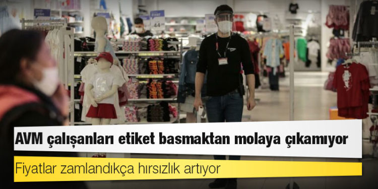 AVM çalışanları etiket basmaktan molaya çıkamıyor