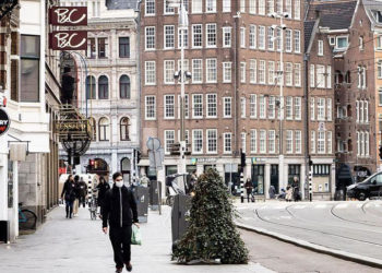 Hollanda'da Omicron varyantı önlemleri: Zorunlu olmayan işletmeler bir ay kapatılıyor!