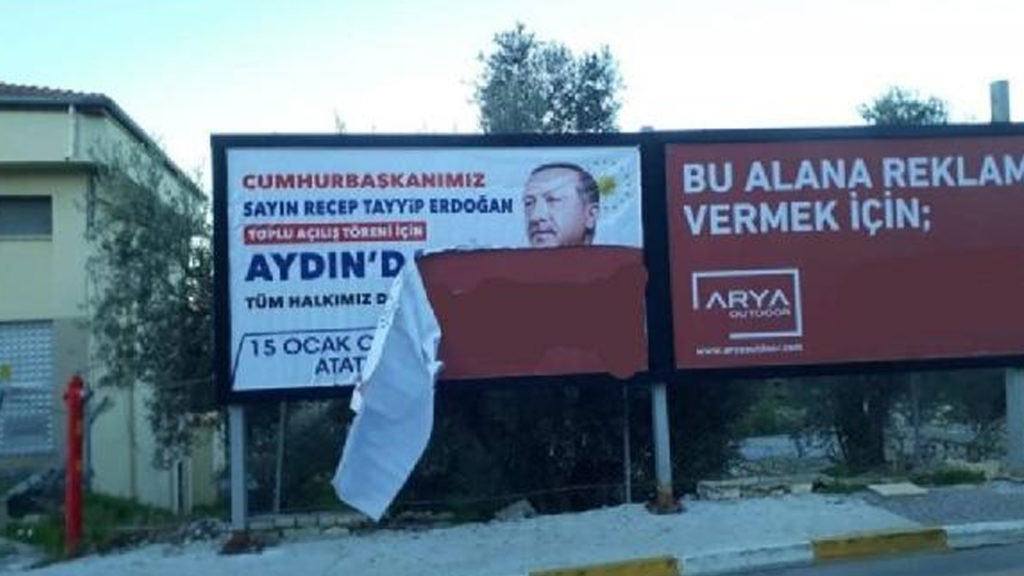 Erdoğan’ın afişlerini yırtan kişi gözaltına alındı