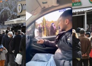 'Dombra' dinleterek yağ kuyruğunda bekleyenlerle alay etti