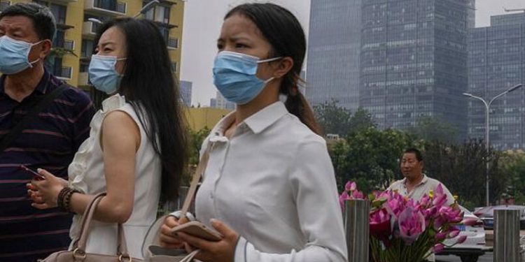 Çin'de günlük Covid-19 vaka sayısı 13 bin ile 2 yılın zirvesinde