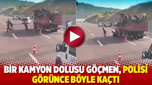 Bir kamyon dolusu göçmen, polisi görünce böyle kaçtı