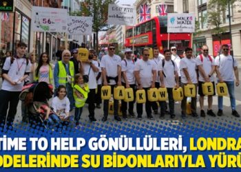 Time to Help g&ouml;n&uuml;ll&uuml;leri, Londra caddelerinde su bidonlarıyla y&uuml;r&uuml;d&uuml;