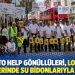 Time to Help gönüllüleri, Londra caddelerinde su bidonlarıyla yürüdü