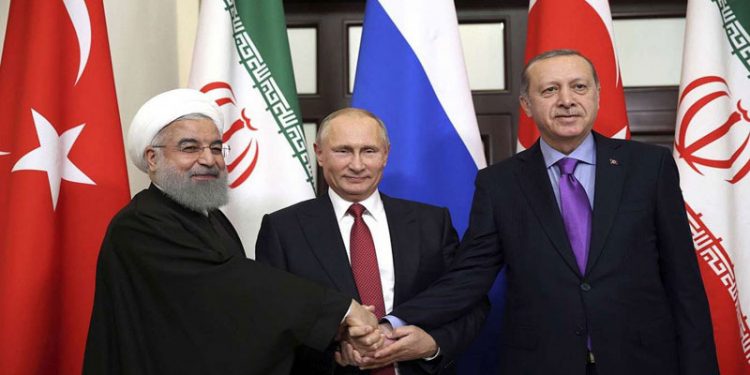 Tahran'da Erdoğan, Putin ve Reisi Suriye zirvesi için bir araya gelecek