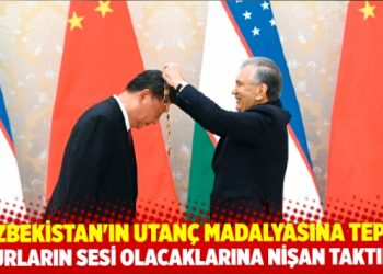 Uygurların sesi olacaklarına zalime nişan taktılar! Utan&ccedil; madalyası tepki g&ouml;rd&uuml;