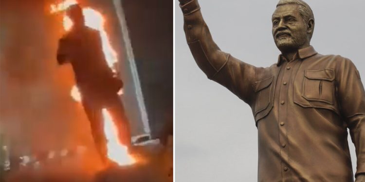 İran’da protestocular Kasım Süleymani’nin heykelini ateşe verdi