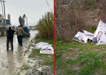 Erdoğan'ın afişlerini söküp dereye attılar