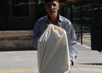 ÇGD’den ‘Bir torbanın ağırlığı’ fotoğrafına ödül