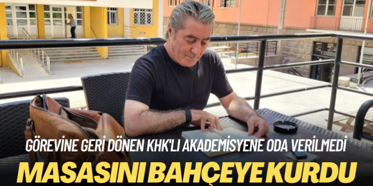 Görevine geri dönen akademisyen oda verilmeyince masasını bahçeye kurdu