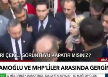 MHP standını ziyaret etmek isteyen İmamoğlu'nun üstüne yürüdüler