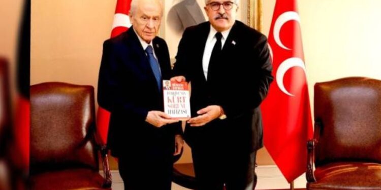 PKK’lı Remzi Kartal’la fotoğrafı olan Hüseyin Yayman, Bahçeli’yi ziyaret etti